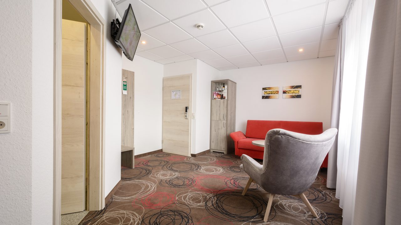 Gemütliche Sitzecke im Zimmer – Hotel Engelhorn Leimen